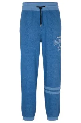 BOSS x NFL oversize-fit tracksuit bottoms in denim-look cotton