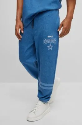 BOSS x NFL oversize-fit tracksuit bottoms in denim-look cotton