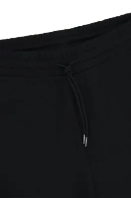 Cotton-terry tracksuit bottoms with Happy HUGO logo